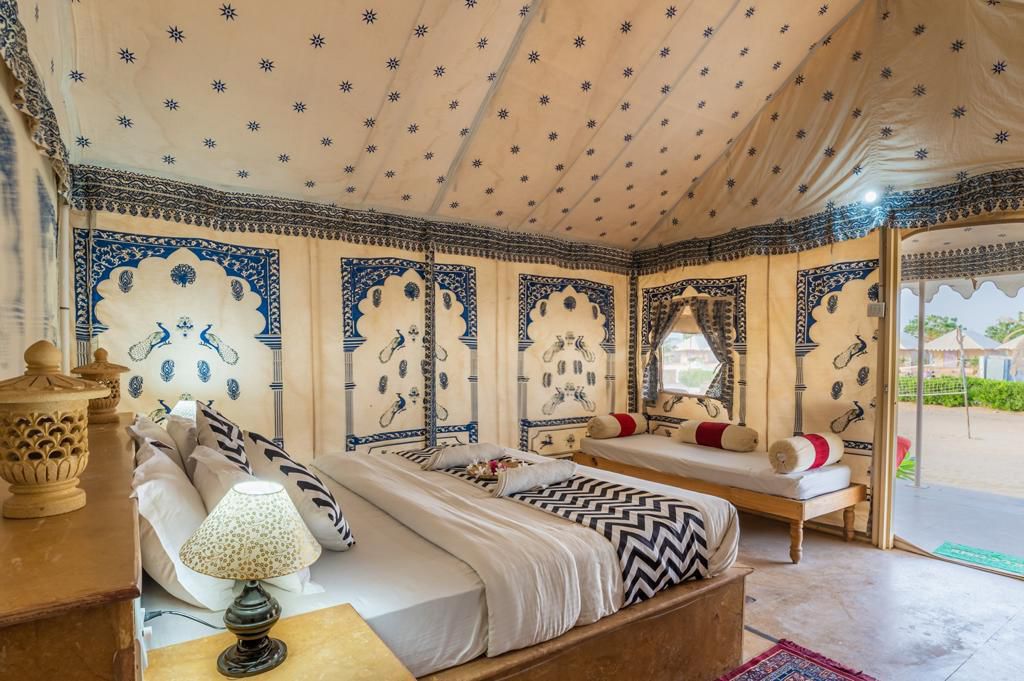 Royal Swiss tent interior with Rajasthani printed walls