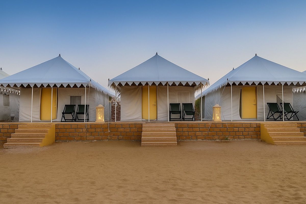 Row of Swiss tents at evening in Jaisalmer desert camp