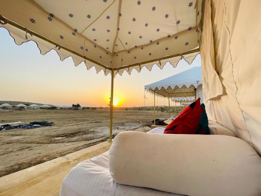 Swiss tent veranda seating at sunset in the desert camp